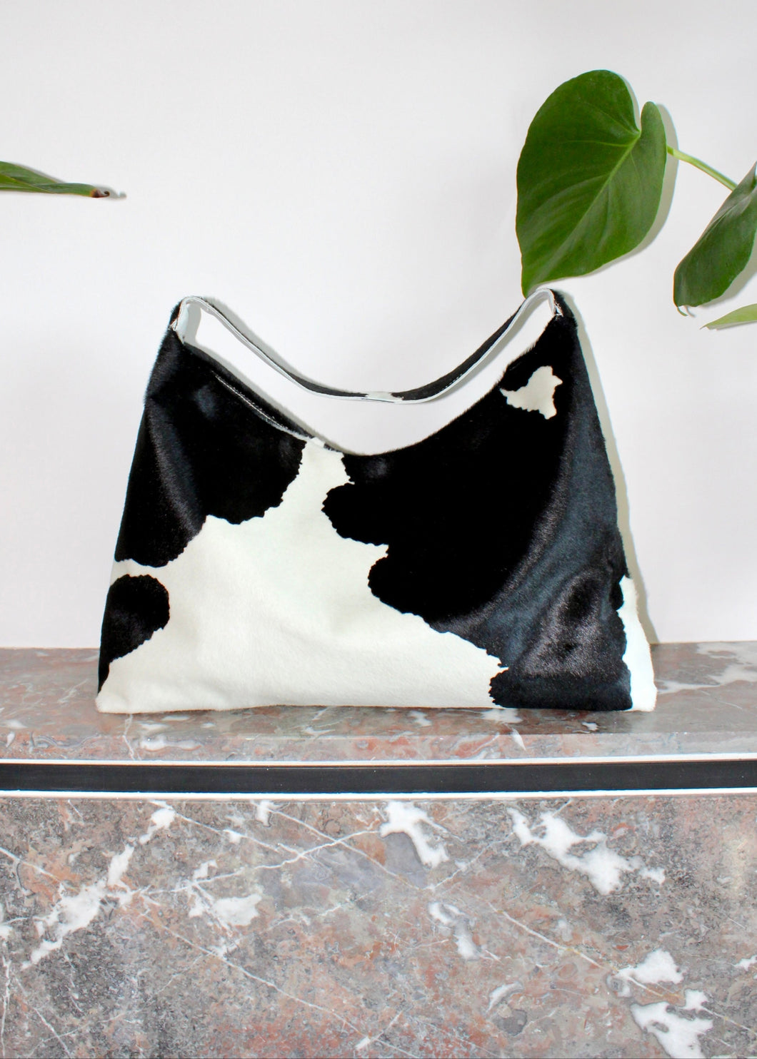 Sloane bag in cowprint leather